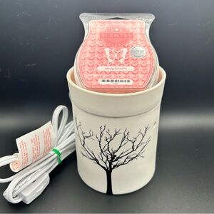 Scentsy Tilia electric wax warmer.
With 1 pack of Spring Forward wax